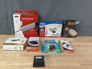 lot 335 image: New Cord Concealer, USB Adapter, New Computer Mouse and More  R