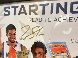 lot 39A image: Minnesota Timberwolves 11x17 Promotional Reading Print Autographed by Kevin Garnett and Karl-Anthony Towns NBA Basketball C