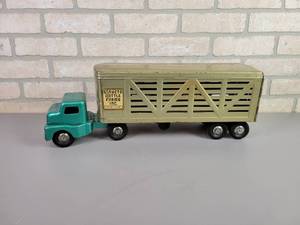 lot 2 image: 1950s STRUCTO Snub Nose Semi-Truck w Cattle Trailer - Approx. 21 Long