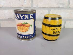 lot 85 image: Vintage Tin Litho J. Chein Happy Days Barrel Coin Bank & WAYNE Diced Carrots Can Coin Bank