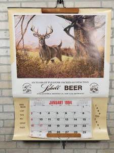 lot 155 image: 1994 Schells Beer Wall Calendar - New Ulm, MN - Approx. 31 x 42 - Features Monarch of the Forrest by Artist R.J McDonald