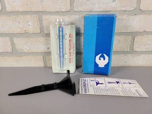 lot 198 image: Vintage New Ulm Telecom Inc. Rain gauge in Original Box