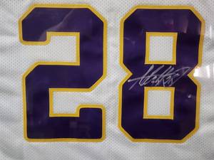 lot 3 image: Game (Used) Minnesota Viking Adrian Peterson Autographed Jersey