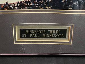 lot 111 image: Framed Photo of the Minnesota Wilds Game at the Ecel Energy Hockey Arena