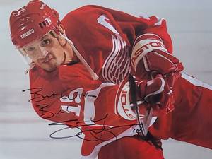 lot 36 image: Framed Autographed Photo by Detroit Red Wings player Steve Yzerman