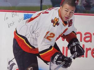 lot 35 image: Framed Photograph Signed by Calgary Flames Hockey Player Jarome Igilna
