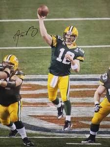 lot 55 image: Awesome Autographed Photograph by Green Bay Packers Great Aaron Rodgers with COA