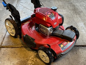 lot 3 image: Toro Mow n Stow Lawnmower