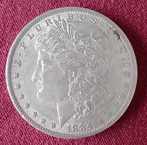 lot 1 image: 1884-O Morgan Dollar