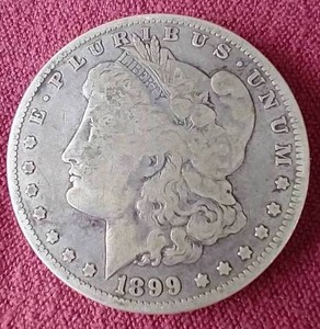 lot 38 image: 1899-O Morgan Dollar