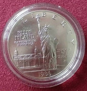 lot 51 image: 1986 Ellis Island Silver Dollar