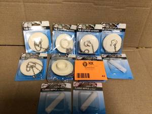 lot 42 image: Lot of Bathtub Plugs and Misc  Customer Returns See Pictures