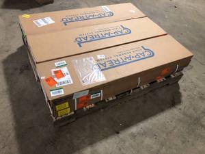 Pallet of assorted Cap A Tread  Dusk CherryShea Oak 47 in. L x 12-18 in. W x 1-1116 in. T Vinyl Overlay to Cover Stairs 1 in. Thick