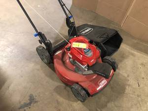 Toro  22 in. Recycler SmartStow Briggs & Stratton High Wheel FWD Gas Walk Behind Self Propelled Lawn Mower FOR PARTS OR REPAIR Customer returns Review all pictures