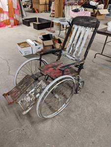 lot 3 image: Antique Haunted Wheelchair