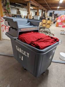 lot 49 image: Two Large Red Stage Curtains And Rubbermaid Rolling Bin