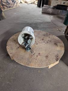 lot 57 image: Two Buckets Of Casters And A Rotating Platform