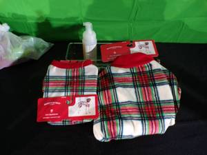 lot 251 image: Brand New Dog Pajama Lot with Shampoo and Plastic Bin Bonus