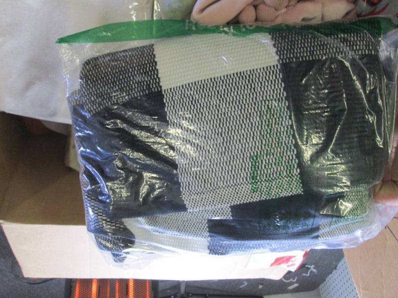 box of new decorative pillow covers...