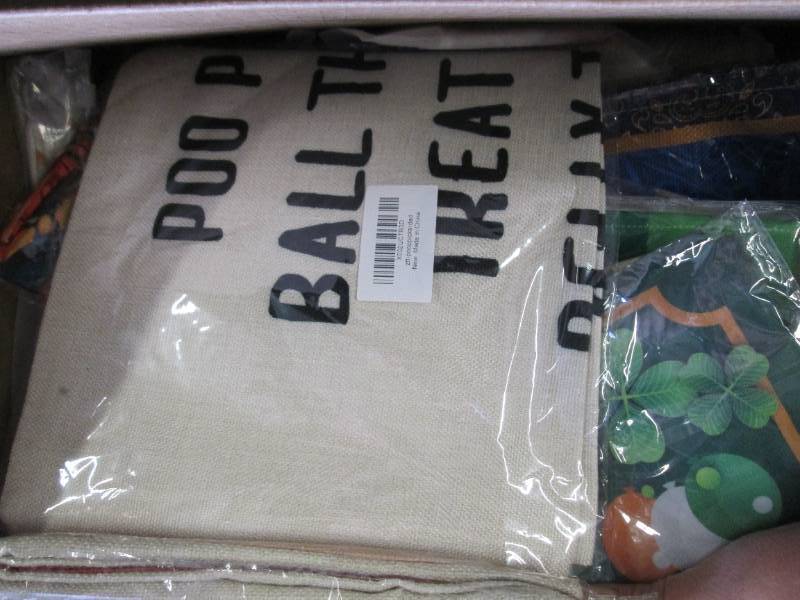 box of new decorative pillow covers...