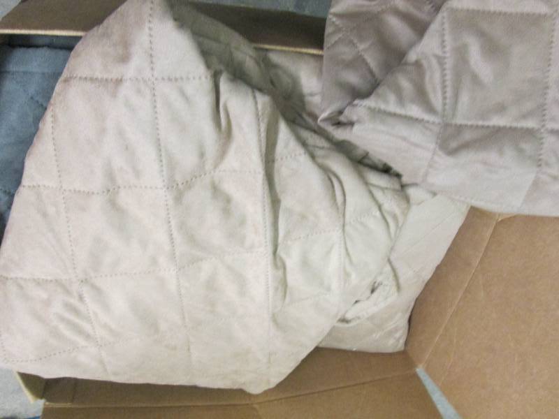 Box of couch covers ...