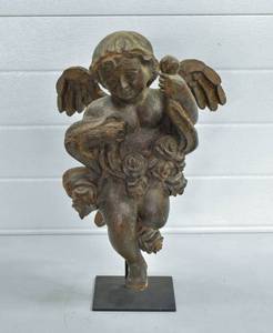 lot 12 image: Carved Wood Cherub with Roses on Stand