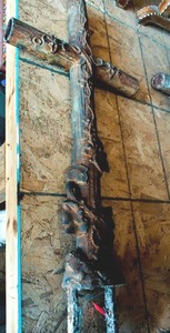 lot 110 image: Cast Iron Cross with Vine Detailing