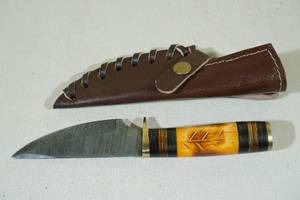 lot 60 image: Damascus Style Blade Hunting Knife with Carved Handle