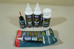 lot 69 image: Lucas Oil Extreme Duty Gun Oil, Grease, and Cleaner