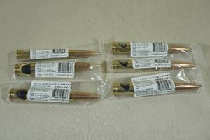 lot 76 image: 6 50 Caliber Bottle Openers