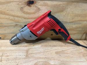 lot 37 image: MILWAUKEE 8 Amp Corded 12 in. Hammer Drill Driver