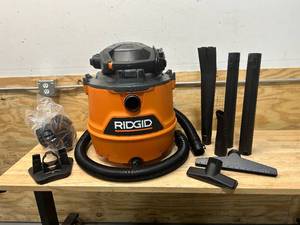 lot 58 image: RIDGID 16 Gallon 6.5 Peak HP NXT WetDry Shop Vacuum with Detachable Blower, Filter, Locking Hose and Accessories