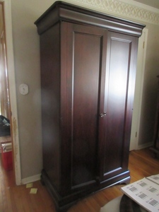 lot 107 image: TV OR CLOTHING ARMOIRE WITH POWER STRIP AND WRAP AROUND DOORS