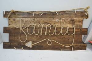 Rustic wooden rope sign