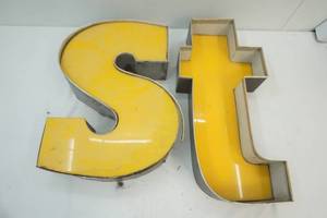 T sign and S sign