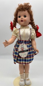 lot 24 image: Vintage Mary Lu Walker Doll in Plaid Jumper
