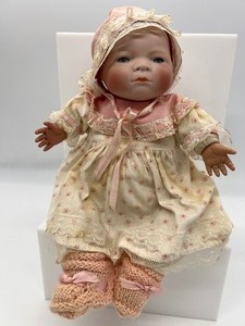 lot 45 image: Vintage Grace Putnam Bye-lo Doll - Sleepy Eyes - Pink Dress