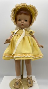 lot 107 image: Vintage Effanbee Composition Doll - 16 Yellow Dress