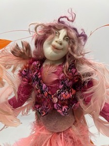 lot 129 image: Artisan Katie Gardenia Doll - Pinks