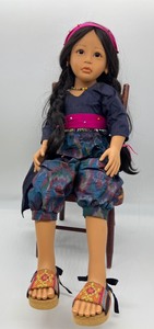 lot 139 image: Gotz German Girl Doll with Vintage Chair