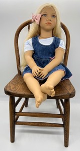 lot 143 image: Annette Himstedt Blonde Doll with Vintage Chair