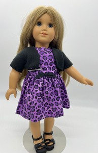 lot 186 image: American Girl Doll - Purple Dress