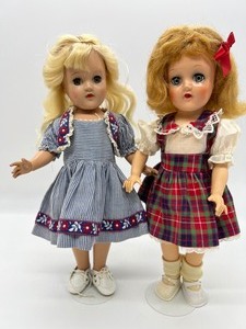lot 250 image: Pair Vintage Ideal Toni Dolls P-90 - Blue Striped and Plaid Dresses