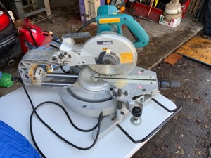 lot 6 image: Makita  13 Amp 10 in. Slide Compound Miter Saw Model LS1013