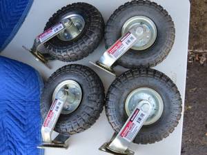 lot 14 image: Lot of 4 10 Pneumatic Swivel Caster Wheels