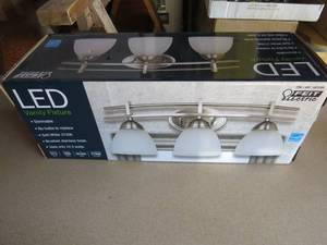 lot 65 image: New - Feit Electric LED Vanity Fixture - Brushed Stainless