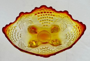 lot 20 image: Vintage Amberina Footed Bowl with Grape Motiff