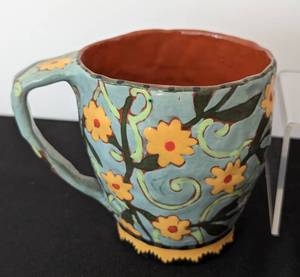 lot 69 image: Four Colorful Artisan Mugs