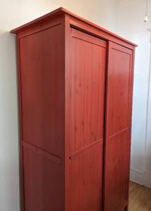 lot 21 image: IKEA Red Wardrobe with Sliding Doors