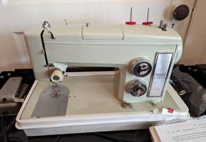lot 87 image: Kenmore Sewing Machine and Rolling Cart